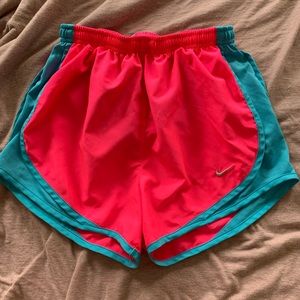 Pink and blue nike shorts